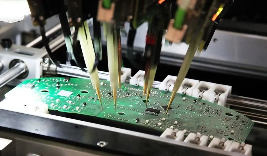 Automated PCB Assembly Line Ensuring IPC-6012 Compliance – SMT manufacturing process assembling PCBs according to IPC-6012 quality guidelines.