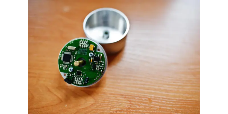 Close-up of a small PCBA prototype used for electronics functional testing and validation