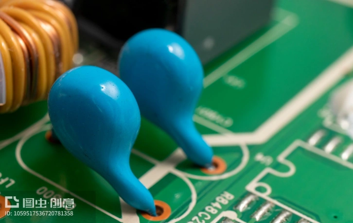 electronic components varistor blue disc type surge protection component on PCB