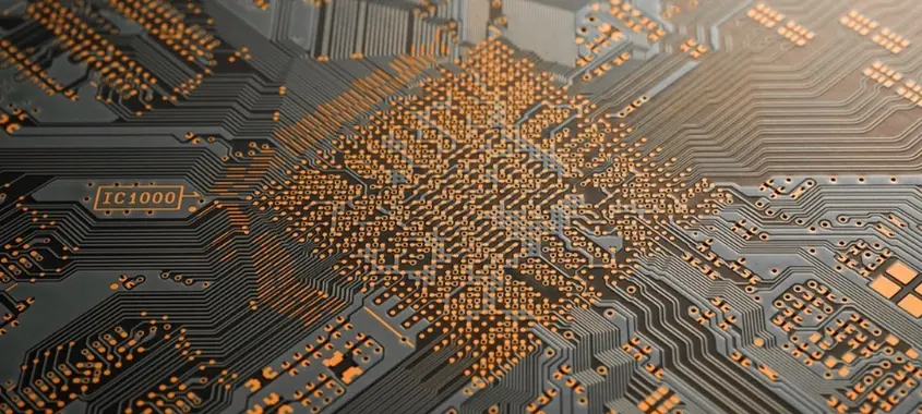 High-density PCB close-up showing intricate routing, essential for achieving precision-controlled impedance in modern designs.