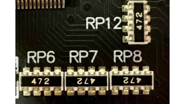 Close-up image of a resistor array used in PCB assembly for current regulation and voltage division.