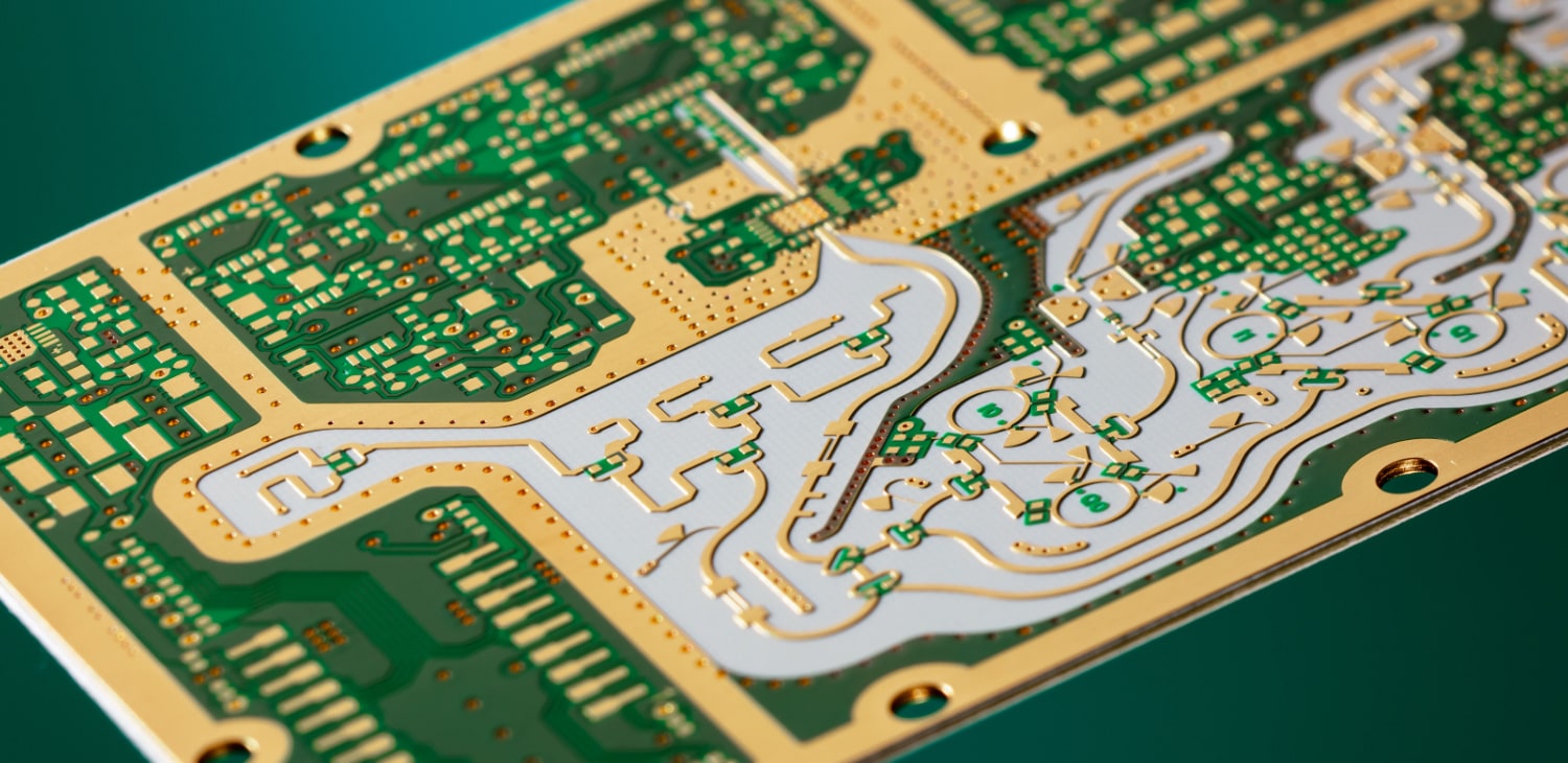 A high-precision RF PCB featuring complex gold-plated microwave transmission lines, specialized grounding vias, and electromagnetic shielding layout for high-frequency signal integrity.