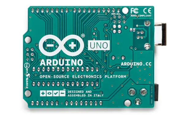 Bottom view of an Arduino UNO R3 PCB showing solder joints, copper traces, and the official Arduino logo.