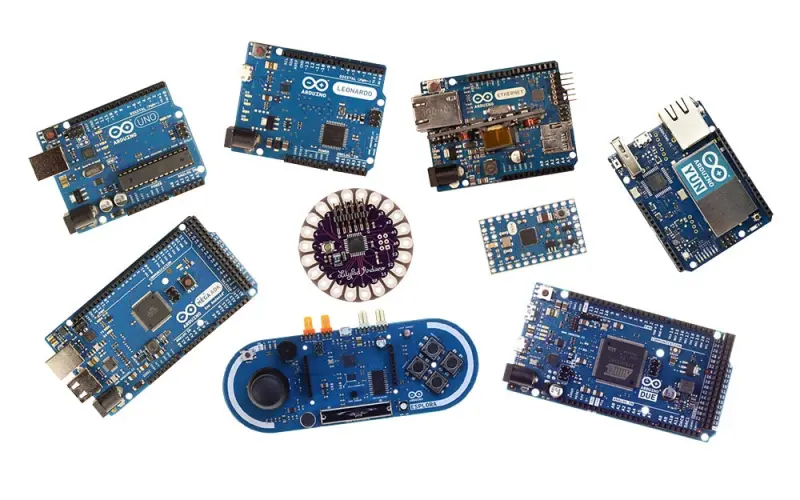 A collection of various Arduino microcontroller boards including Uno, Mega, Leonardo, and LilyPad.