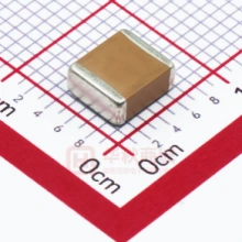 Surface mount SMD ceramic capacitors soldered on a printed circuit board PCB next to an integrated circuit