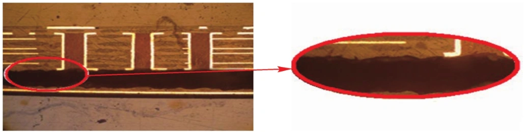 Close-up cross-section micrograph with circled trace tearing detail