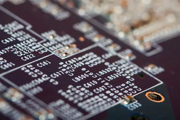 PCB silkscreen (also called the legend or overlay layer) is the printed layer of text and symbols on the top and/or bottom of a board